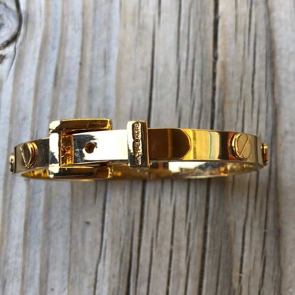 Michael Kors Jewelry - Michael Kors High Polish Gold Tone Buckle Bangle!